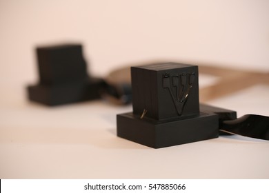pair of tefillin and Tallit A symbol of the Jewish people, a pair of tefillin with black straps, isolated on a white background, with room for text. (Bar Mitzvah Jews 13 years old)

