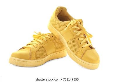 yellow tennis shoes