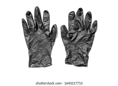 pair of thin black latex gloves isolated on a white background. New disposable rubber gloves. The concept of successful work of a chef of a surgeon or cleaning