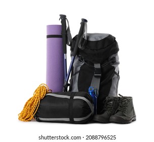 Pair of trekking poles and camping equipment for tourism on white background - Shutterstock ID 2088796525