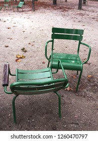 Pair Of Two Empty Chairs Facing Each Other In Paris Garden Park. Concept Of Dialogue, Communication, Meeting Place. Isolated Metal Seat Furniture, No People. Peaceful Love Scene Or Silent Togetherness