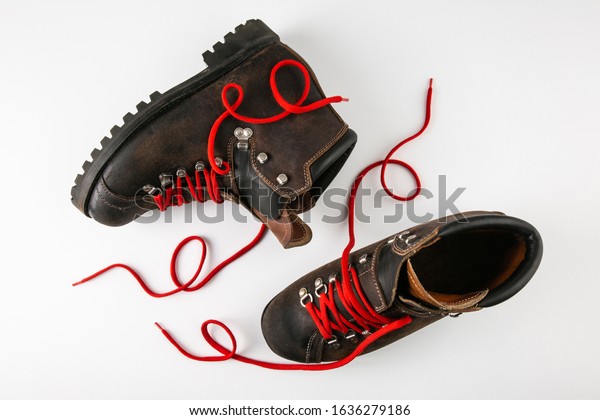 old school hiking boots with red laces