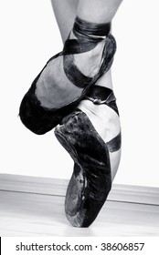 A Pair Of Well Worn Black Ballet Shoes, Studio Shot Black And White Blue Filtered