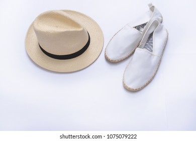 Pair Of White Shoes With Panama Hat Isolated 
