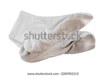 Pair of white used dirty socks isolated, top view, clipping path