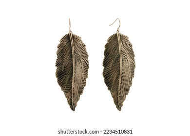 A pair of womens earrings feathers isolated on background - Shutterstock ID 2234510831