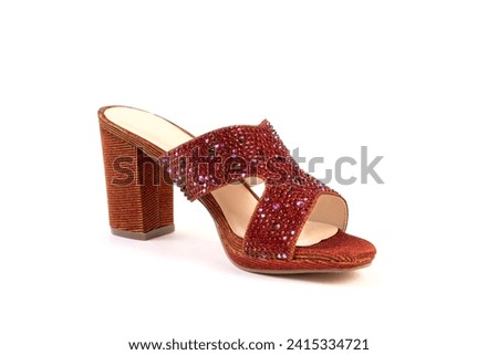 A pair of womens sandals isolated on white background. Women's sandals with high heels. Beige summer female sandals.