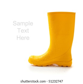 A Pair Of Yellow Rainboots  On A White Background With Copy Space