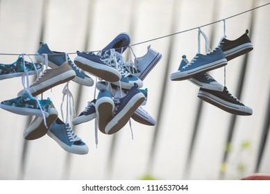 Pairs Sneakers Shoes Hanging On Rope Stock Photo 1116537044 | Shutterstock