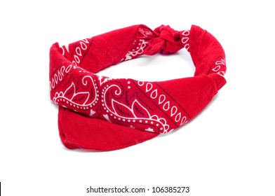 paisley patterned red bandana on a white white background