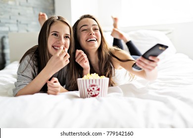 A pajama party, entertainment and junk food concept - Powered by Shutterstock