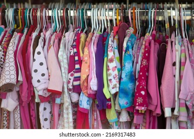 Pajamas For Girl In Thrift Shop Second Hand Clothing Clothes Rack Pink Flannel Kids Night Wear