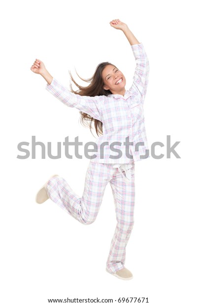 Free Photo Full Length Portrait Of Carefree Caucasian Girl Dancing In Red Pajamas On Light Wall Gorgeous Young Woman In Cute Sleepwear Jumping With Smile