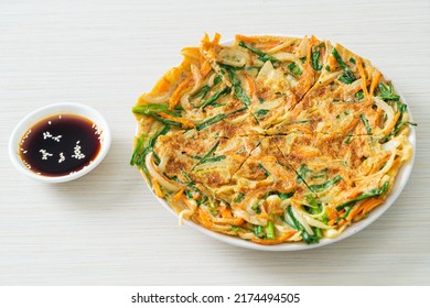 Pajeon or Korean pancake or Korean pizza - Asian food style - Shutterstock ID 2174494505