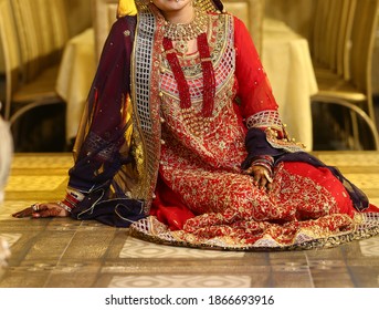 Pakistan Bridal  Wearing Wedding Red Lehenga Suit, Bridal Getting Ready Her Wedding Day
Karachi, Pakistan, November 25, 2019