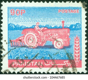 PAKISTAN - CIRCA 1979: A stamp printed in Pakistan shows image of Harvest Truck in blue color, circa 1979