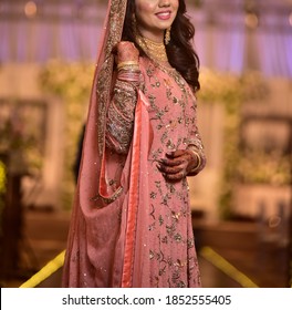 Pakistan Indian Bridal Wearing Wedding Lehenga Suit, Bridal Getting Ready Her Wedding Day
Karachi, Pakistan, November 17, 2018