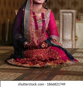 Pakistan Indian Bridal  Wearing Wedding Red Lehenga Suit, Bridal Getting Ready Her Wedding Day
Karachi, Pakistan, November 25, 2019