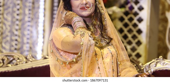 Pakistan Indian Bridal  Wearing Wedding Red Lehenga Suit, Bridal Getting Ready Her Wedding Day
Karachi, Pakistan, November 25, 2019