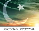 Pakistan national flag hide in beautiful clouds. Pakistan national flag for independence day.