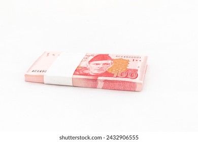 Pakistan one hundred rupees banknote bundle on white isolated background