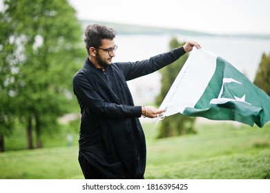 Pakistani Bangladesh Man Wear Black Traditional Clothes And Eyeglasses Pose Outdoor.