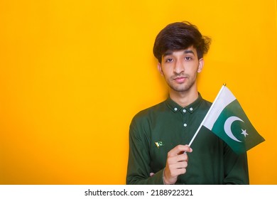 Pakistani Boy With Pakistan Flags In Hand, Pakistan Independence Day