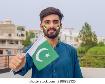 Pakistani Boy With Pakistan Flags In Hand, Pakistan Independence Day