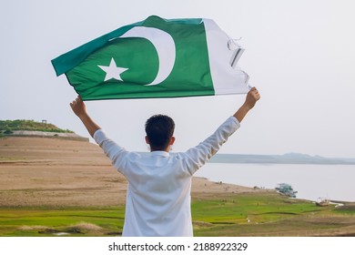 Pakistani Boy With Pakistan Flags In Hand, Pakistan Independence Day