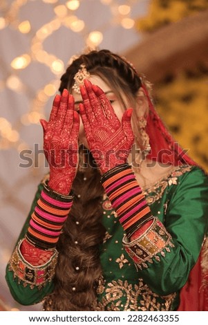 pakistani bride's wedding with mehendi  hands close up