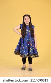 A Pakistani girl is wearing traditional dress. Asian dress - Indian dress - Kurti