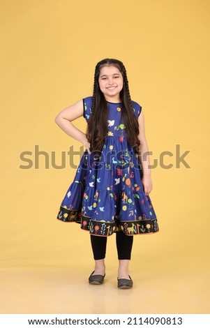 A Pakistani girl is wearing traditional dress. Asian dress - Indian dress - Kurti