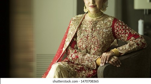 Pakistani Indian bridal showing wedding mehndi design and necklace and earrings jewelry
Islamabad, Pakistan, 15 July, 2019