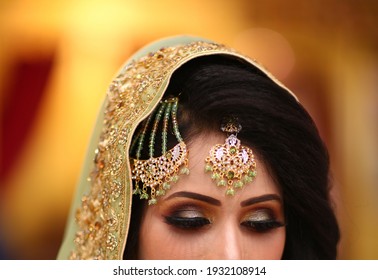 Pakistani Indian bridal wearing Necklace and earring, Bridal showing wedding necklace and nose ring
Karachi, Pakistan, 01 January 2021