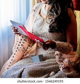 Pakistani Indian Bride Reading Letter From Her Groom