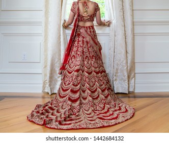 Pakistani Indian Bride Showing Wedding Lehenga Sharara Design