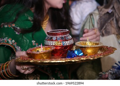 Pakistani Indian bridesmaids holding henna plate, Girls holding mehndi plates   