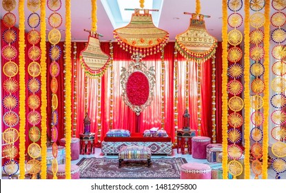 Pakistani Indian wedding sangeet yellow flower stage decoration