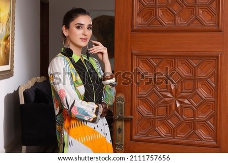 A Pakistani Model is wearing traditional dress Shalwar kameez - Kurti