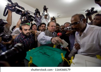 Pakistan-Lahore,
Nawaz Sharif (C), Leader Of The Pakistan Muslim League - Nawaz (PML-N) Political Party, Casts His Vote For The General Election At A Polling Station In Lahore May 11, 2013.

