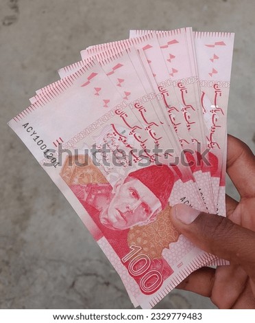 Pakpattan, Pakistan - Apr 30, 2023. Pakistani Currency Banknote One hundred Business and Finance concept