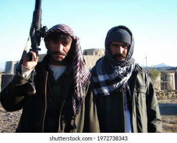 PAKTIA, AFGHANISTAN - January 10, 2007: Officers With The Afghan Border Patrol (ABP) Pose For A Photo In An Outpost Along The Disputed Afghan-Pakistan Boarder During The War In Afghanistan.