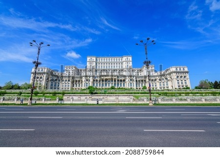 The Palace of the Parliament also known as People's House (Casa Popoprului) in Constitutiei Square (Piata Constitutiei) in Bucharest, Romania, in a sunny spring day Stock photo © 