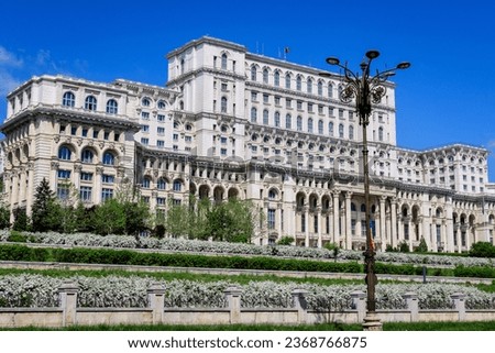 The Palace of the Parliament also known as People's House (Casa Popoprului) in Constitutiei Square (Piata Constitutiei) in Bucharest, Romania, in a sunny spring day Stock photo © 