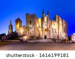 Palace of the Popes, once fortress and palace, one of the largest and most important medieval Gothic buildings in Europe, at night, Avignon, France