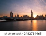 The Palace of Westminster (Houses of Parliament) in London at Sunset. Big Ben can be seen.