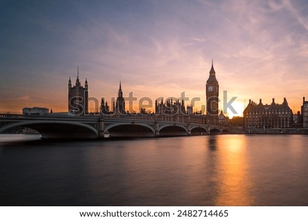 The Palace of Westminster (Houses of Parliament) in London at Sunset. Big Ben can be seen.