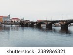 Palacky Bridge in Prague (Czechia) in autumn with Vltava river on foreground. Old town of Prague -  Bridge - photo taken from the river level. Cityscape of Prague.