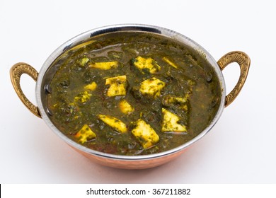 Palak Paneer - A spicy Indian vegetarian dish prepared with mashed spinach and fried paneer
