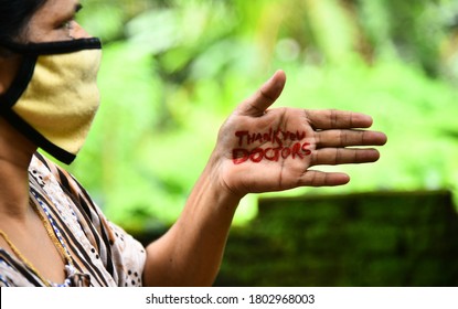 Palakkad , Kerala  / INDIA - August 26, 2020: A Woman Wearing Mask And Giving Gratitude For Doctors. Due To Corona Pandemic Doctors Are Working Immensely In Global. 